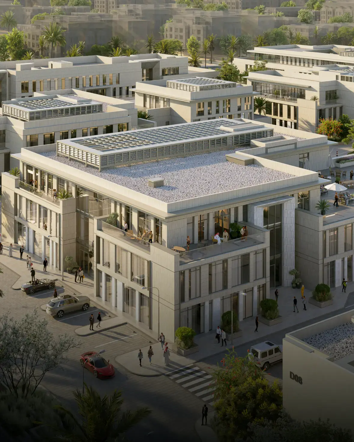 Aerial view of a modern urban complex with minimalist buildings, rooftop terraces, and solar panels. Street lined with trees, cars, and people, conveying a lively urban atmosphere.