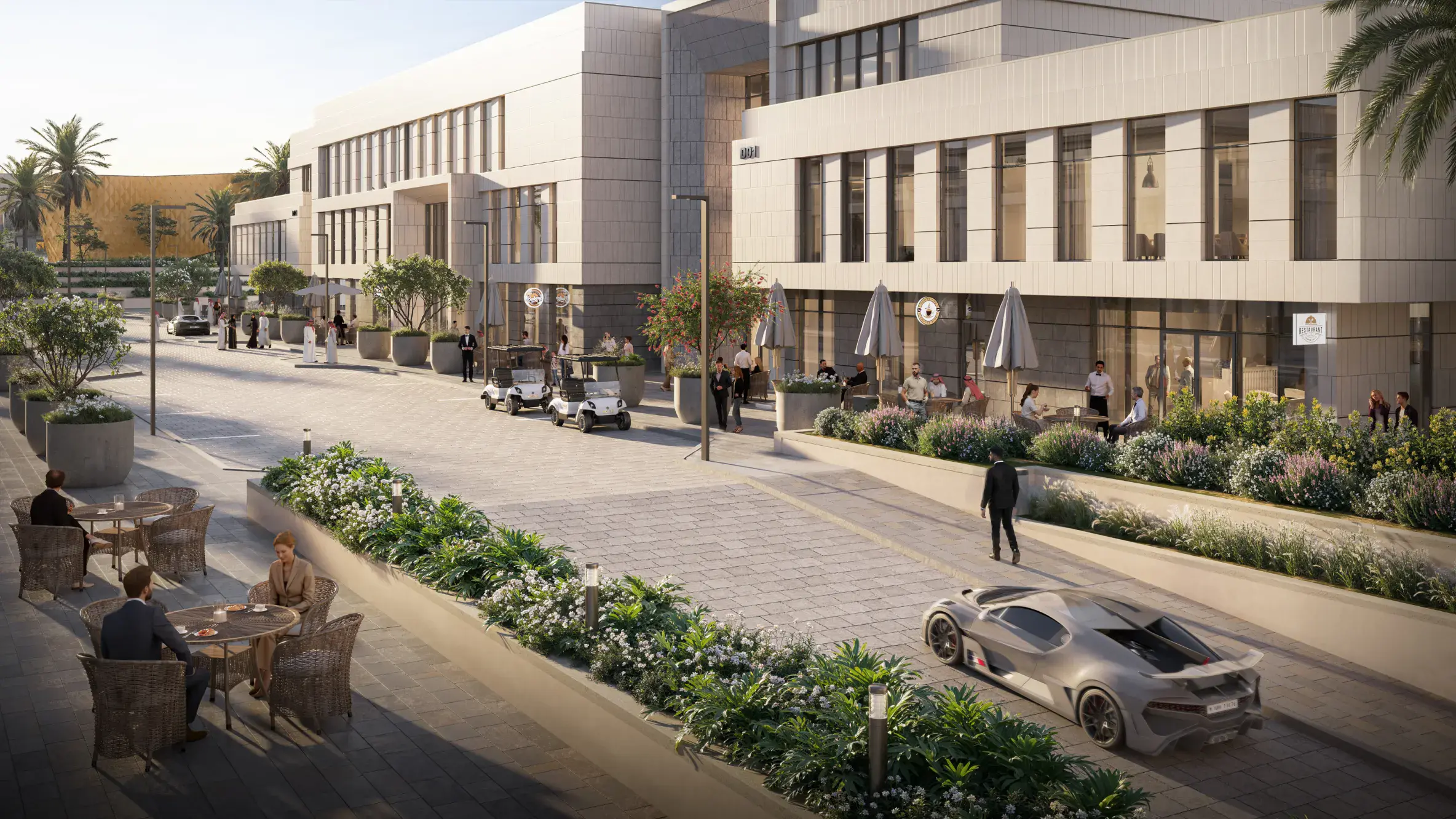 Supercar driving along a quiet street at Prime, with people dining outside cafes and golf buggies parked nearby.